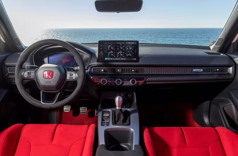 All the usual suspects in the Civic Type R, like red bucket seats, and alloy shift knob. 